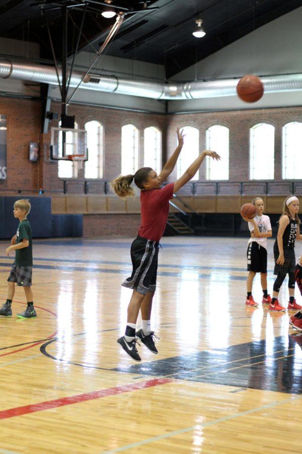 A+camper+shoots+during+Naz+Mitrou-Longs+basketball+camp+on+June+9.+The+camp+was+hosted+by+Long+and%C2%A0Lyndsey+Fennelly+as+well+as+current+and+former+Cyclones.
