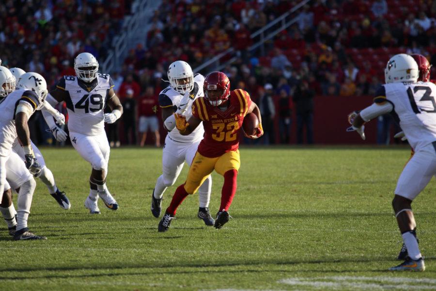 Iowa State freshman David Montgomery breaks free for a big gain in the first half against West Virginia.