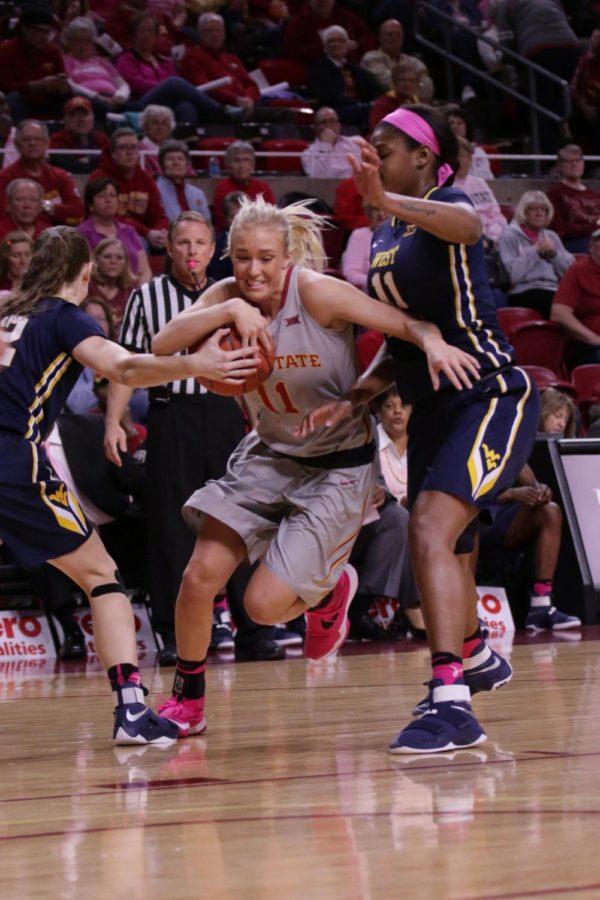 Iowa State redshirt junior, Jadda Buckley, picks up her dribble and rumbles into the lane, splitting the West Virginia defense. Buckley recorded her eighth career 20-point game (fifth of the season).