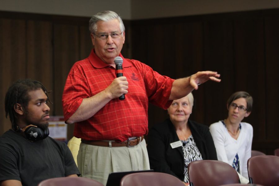 Iowa Regent Larry McKibben speaks during the open forum in the Campanile Room on June 12.