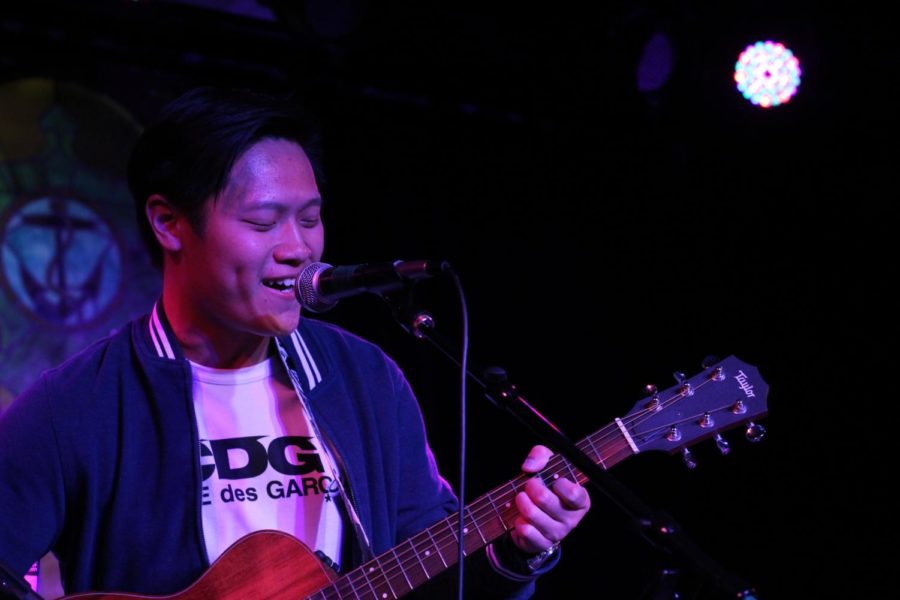 Nick Yeo, a junior studying MIS, performs on Aug. 29, 2017 at the Student Union Board's open mic night in the Maintenance Shop. "Performing excites me. It's always an experience to hear the crowd cheer for you or even when you get a standing ovation," Yeo said about singing at the event. 