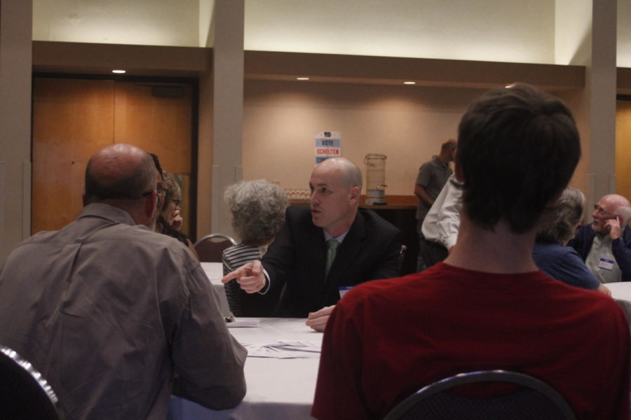 Scholten spoke with attendees of the event before speaking, including Sophomore at Iowa State, Matthew Voss. According to Voss, Scholten spoke with him about building support and Voss plans to support him in his run.