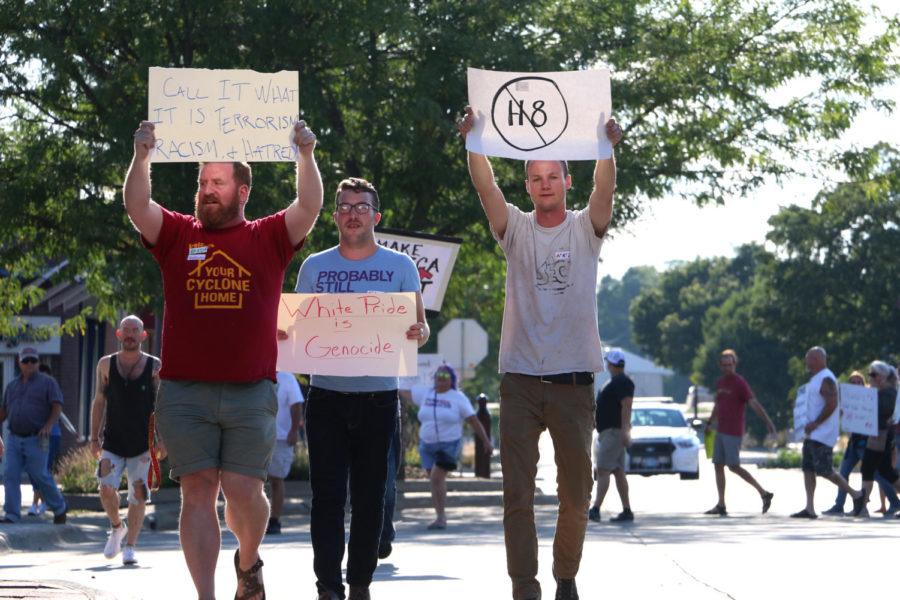 Protesters walk east down Main Street during the Ames Stands Together Opposing White Nationalism event Sunday, Aug. 13. Both Iowa State and Ames community members took part in the event. 