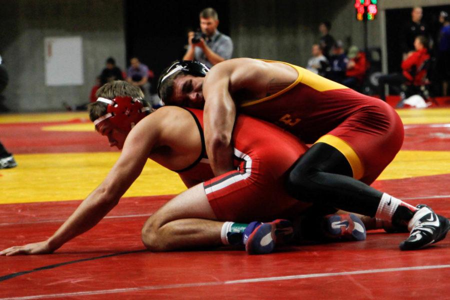 Iowa State redshirt junior Patrick Downey wraps up his opponent during a match at the Harold Nichols Cyclone Open on Nov. 13, 2016. 