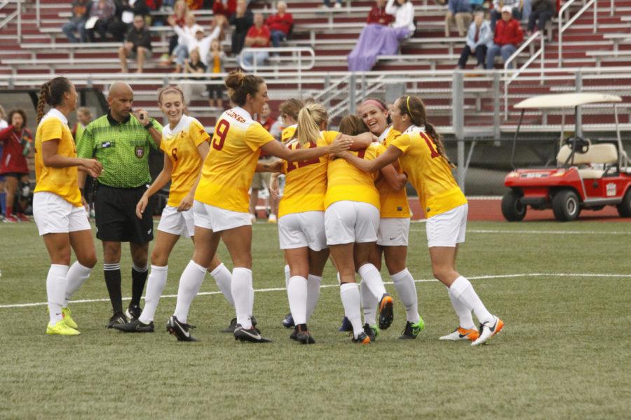 The+Iowa+State+soccer+team+celebrates+after+a+goal+by+senior+Danielle+Moore+late+in+the+second+half+against+South+Dakota.+Moore+scored+the+final+goal+of+the+game%2C+making+the+score+2-0.