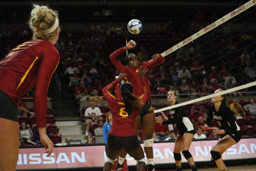 Senior Monique Harris sets up junior Grace Lazard during the third set of the game against Omaha. Iowa State went on to win 3-0.
