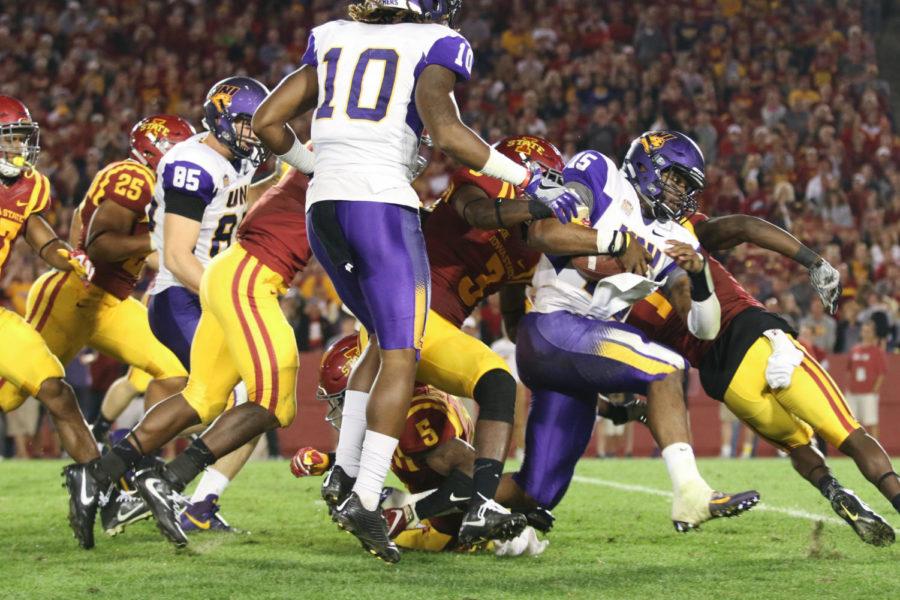 UNI quarterback Aaron Bailey is brought down during the game against ISU Sept. 3. The Panthers would go on to defeat the Cyclones 25-20. 