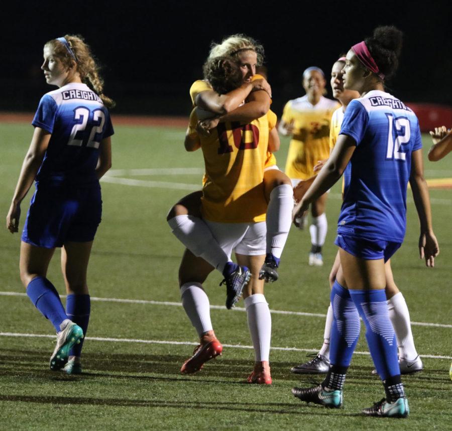 Iowa State players celebrate after junior Brooke Tasker scores the first of three Cyclone goals in their win over Creighton.