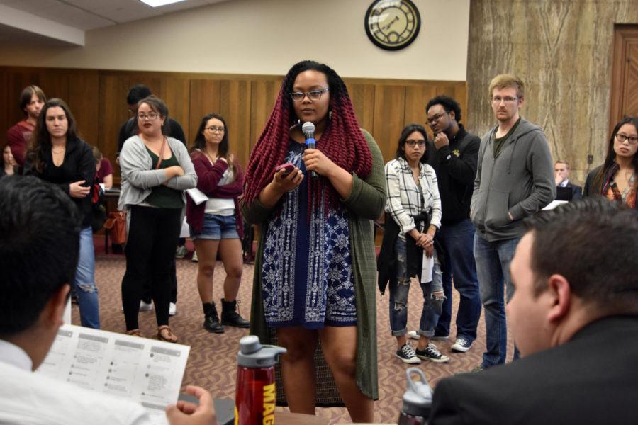 Joi Latson, sophomore in global resource systems, asks senators to respond to offensive Yik-Yak comments regarding diversity and inclusion at Iowa State at the first Student Government meeting of the new cabinet on April 13.