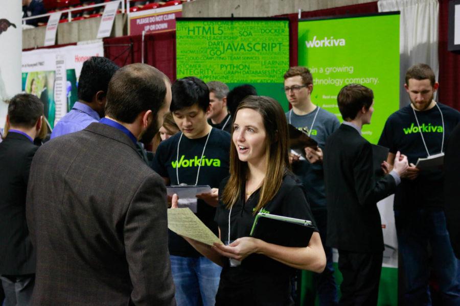 A+prospective+intern+greets+an+employee+from+Workiva.+The+Engineering+Career+Fair+at+Hilton+Coliseum+had+over+350+companies+on+hand+for+students+to+talk+with+Feb.+7.%C2%A0
