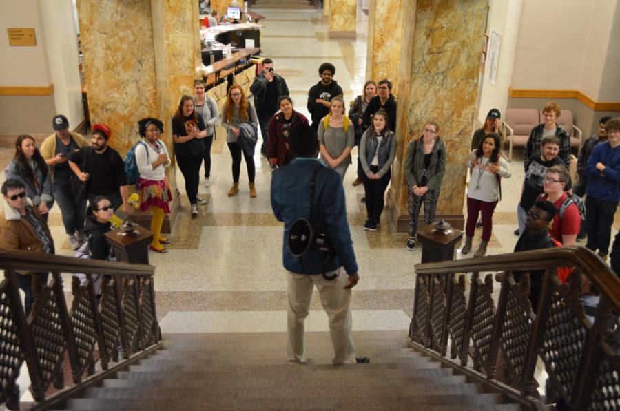 Dozmen Lee, sophomore in political science, speaks to an audience of protesters in Beardshear Hall on Apr. 7 during a protest against prison labor as a form of modern day slavery. People should not be held to the standard of working for sparse wages just because theyre incarcerated, Lee said.