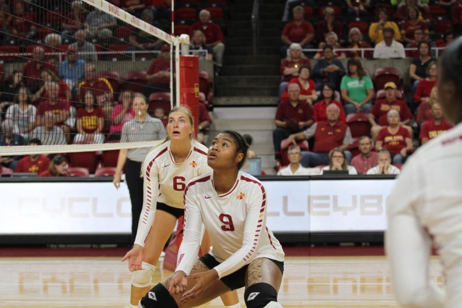 Alexis Conaway and Samara West watch as the ball crosses the net during a match against Kent State on Aug. 25 in Hilton Coliseum. Cyclones went on to sweep Kent State 3-0 in their first match of the season. 