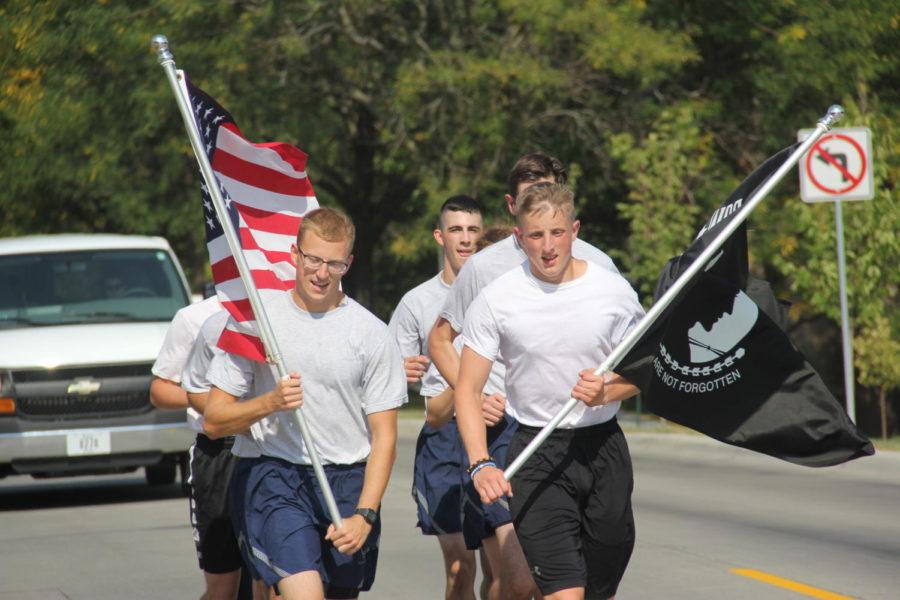 Members of Iowa State Air Force ROTC finish their run from Des Moines to Ames in honor of prisoners of war and those who are considered missing in action.