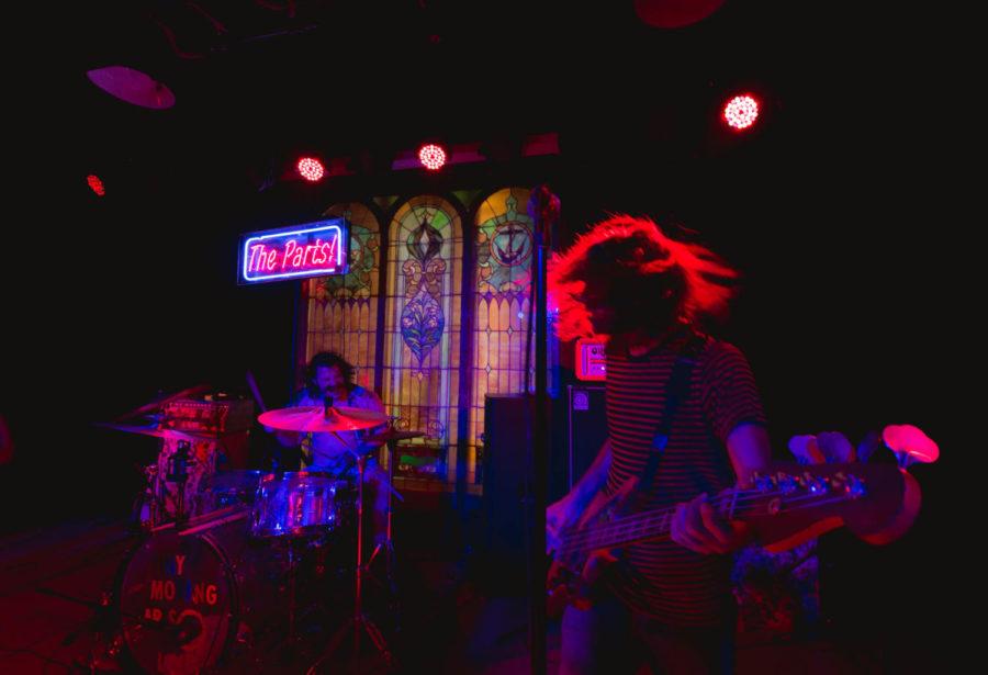 Tiny Moving Parts preforms at the Maintenance Shop in the Memorial Union on Sept. 15, 2017. The band is composed of Dylan Mattheisen on guitar, Matthew Chevalier on bass and William Chevalier on the drums.