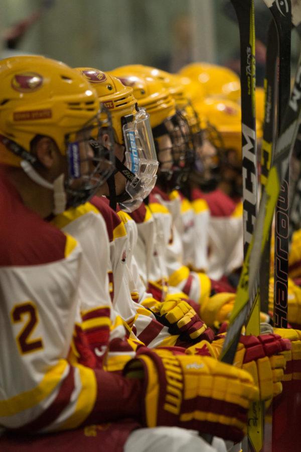 Members of the Cyclone Hockey sit on the bench waiting for their line change Sept. 15 during the Cardinal and Gold Team Scrimmage. Gold Team won over Cardinal 5-2.