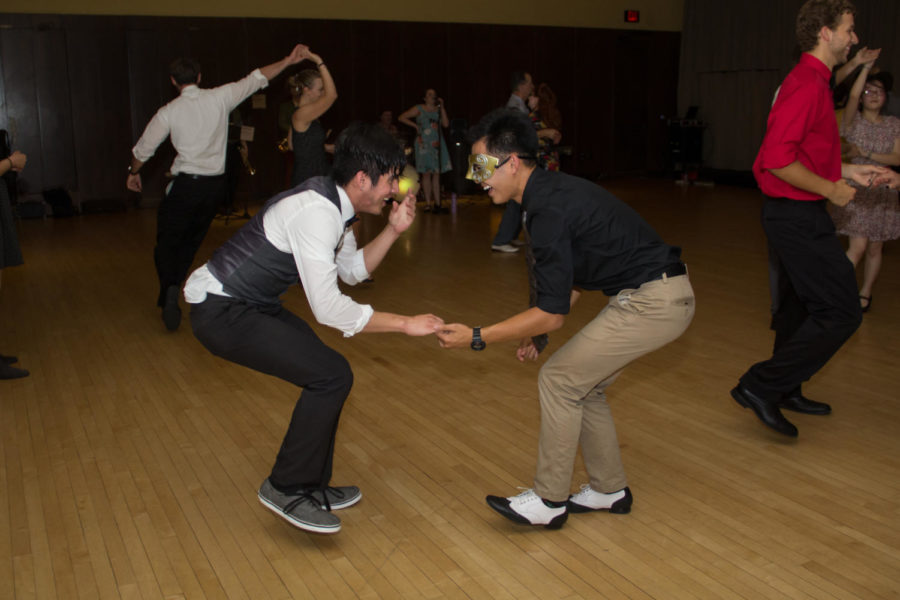 Members of the Cyclone Swing Society, Philip Cordova and Vincent Valeriano dance together during the Cyclone Swing Society's Masquerade ball Sept. 17. Before the ball there was a quick lesson followed by the dance with live music performed by Sweetie &amp; The Toothaches. 