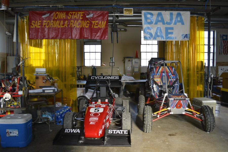 Cars built by the Formula and Baja Society of Automotive Engineers teams are displayed in the Advanced Machinery Systems Laboratory.