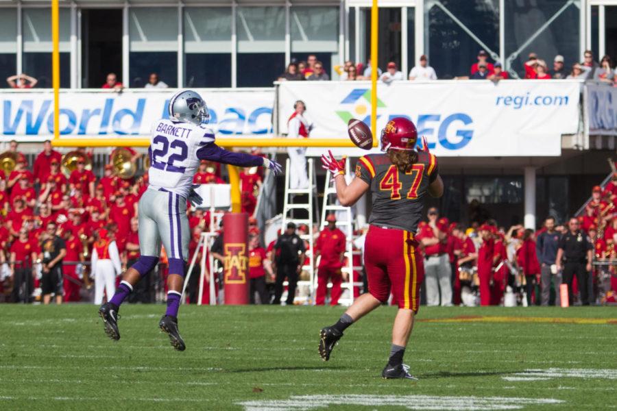 Redshirt sophomore Sean Seonbuchner bobbles a pass during a game against the Kansas State Wildcats, Oct. 29 in Jack Trice Stadium. The Cyclones would go on to lose 31-26.