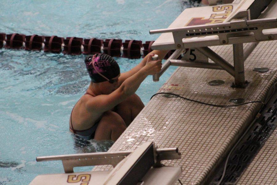 Now-senior Anna Andersen prepares to take off during the Iowa State womens swim meet against Omaha on Oct. 27, 2017, in the Beyer Hall pool. 