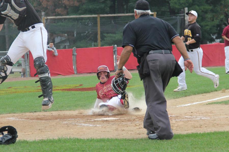 Iowa State Baseball player sliding into home during the Cap Timm Classic.