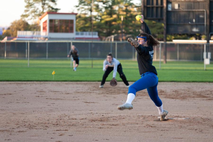 A member of the Iowa State Softball Club winds up a pitch at the Cap Timm Fields on the evening of Tuesday October 17th.