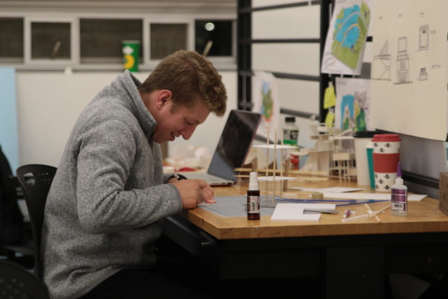 Grant Olson, sophomore in architecture, works on a project in the architecture studio in Design Hall.
