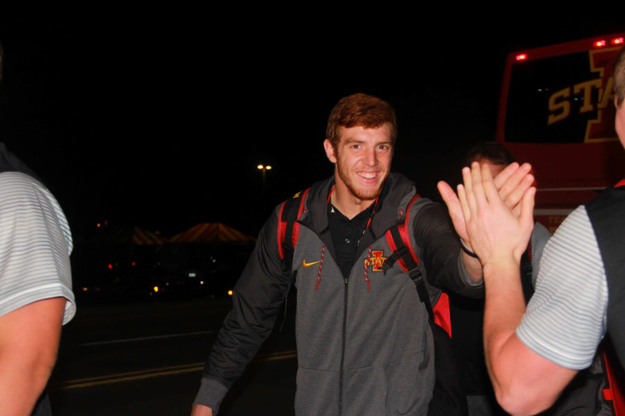 Chase Allen greets fans upon returning from the Cyclones' victory against third-ranked Oklahoma in Norman on Oct. 7. 