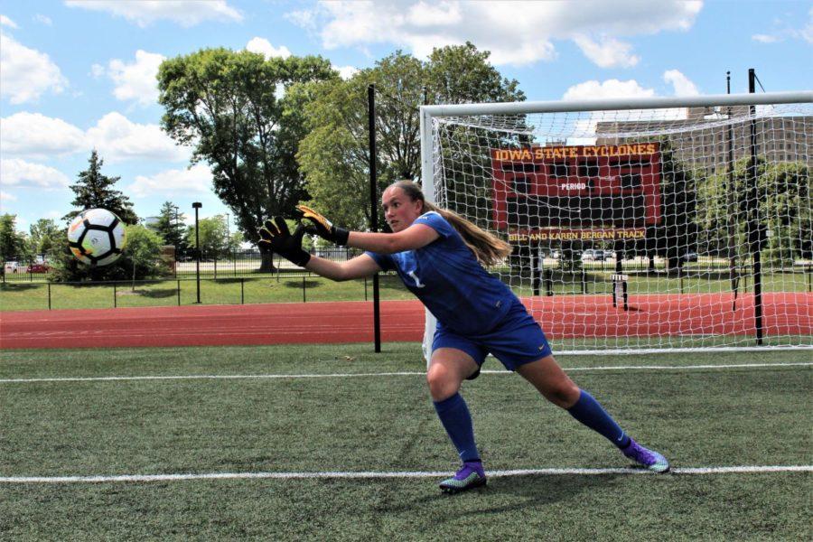 Lindsey Hendon dives for a ball during Iowa State Soccer Media Day. The Senior earned 10 shutouts in her 2016 season.