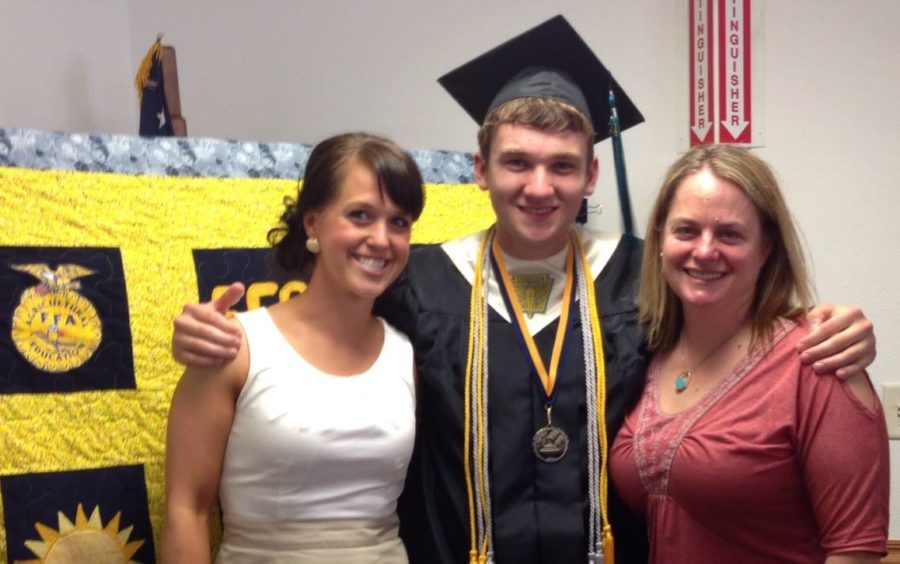 Kody Olson pictured with his FFA adviser, Kristin Flander (right) and interpreter Misty DeWitt (left). 