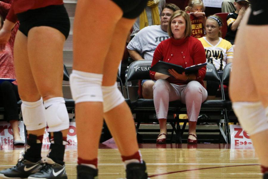 Head volleyball coach Christy Johnson-Lynch watches her players during the game against the University of Iowa at Hilton Coliseum Sept. 9. The Cyclones defeated the Hawkeyes 3-0. 