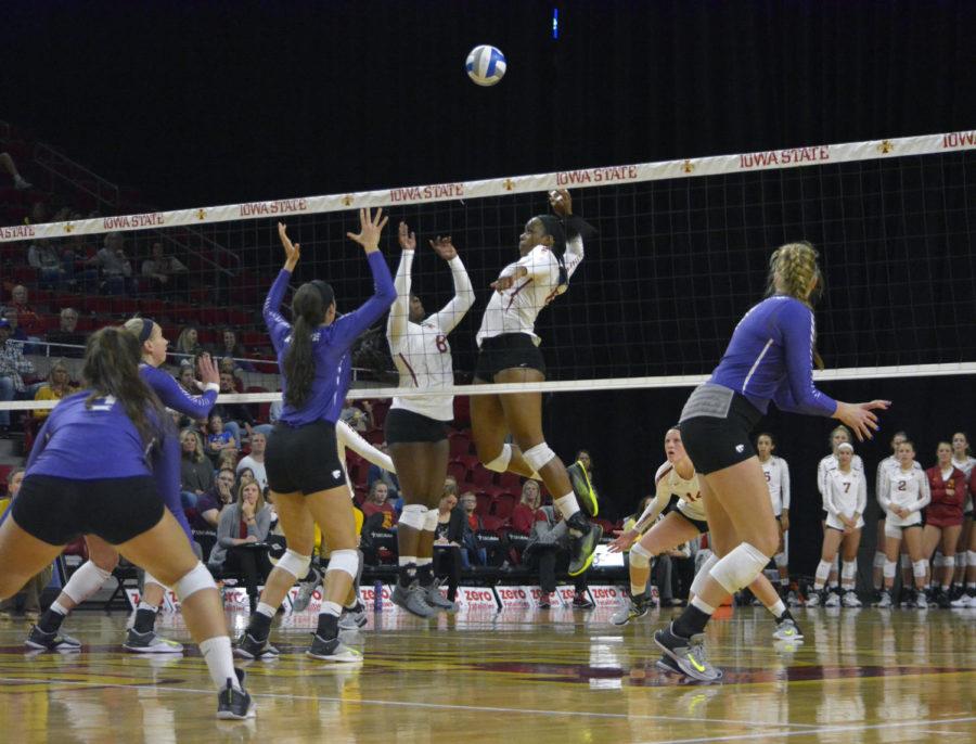 Grace Lazard, middle blocker, hits the ball towards Kansas State on Oct. 11 at Hilton Coliseum. The Cyclones won 3-0.