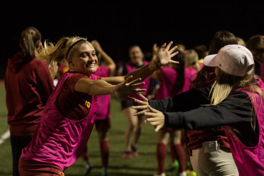 Iowa State soccer team members celebrate after their first goal during their Big 12 home opener versus Kansas on Sept. 29.