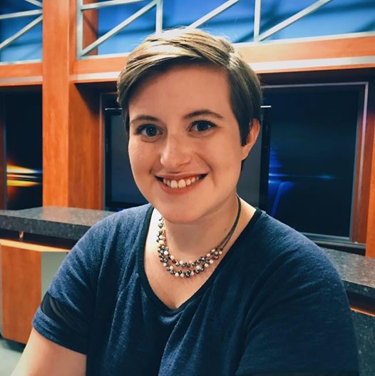 Mary Pautsch, news editor of diversity, sits at the anchor desk at KTIV Channel 4 in Sioux City where she interned in the summer of 2017.