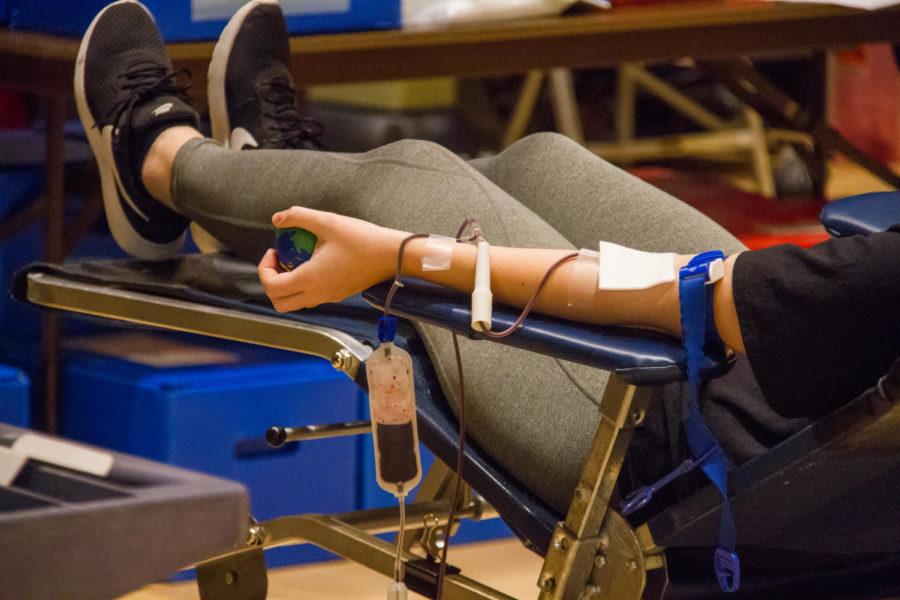 A student donates their blood during the ISU Spring Blood Drive, March 6 in the Memorial Union. The drive, partnered with the American Red Cross, Life Serve and the Mississippi Valley Regional Blood Center, aim to help save countless lives via blood donation.