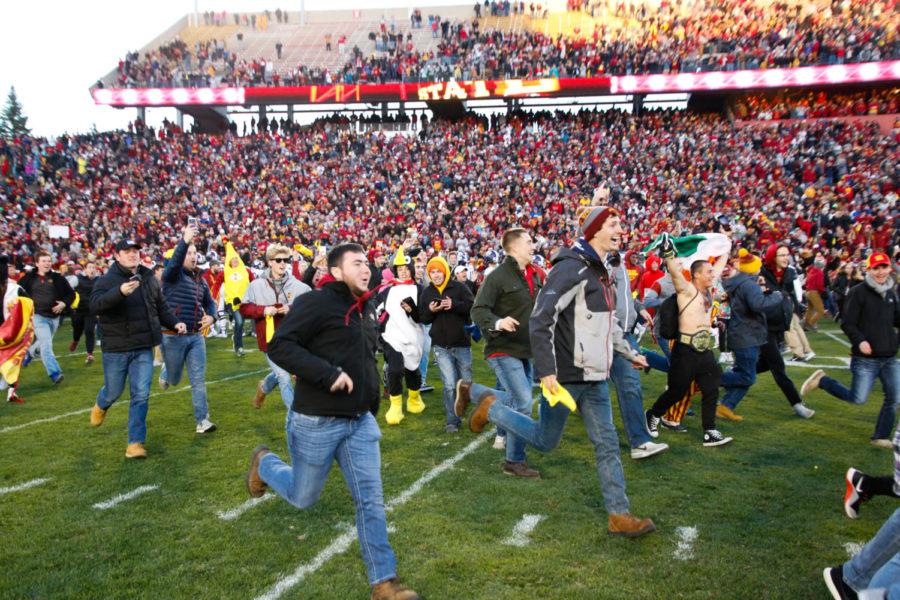 Fans storm the field following Iowa States 14-7 win over No. 4 TCU. 