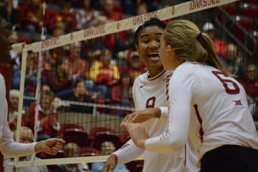 Middle blocker Samara West and outside hitter Alexis Conaway celebrate after a kill by Conaway in the first set on Nov. 2. The Cyclones went on to beat West Virginia 3-0. 
