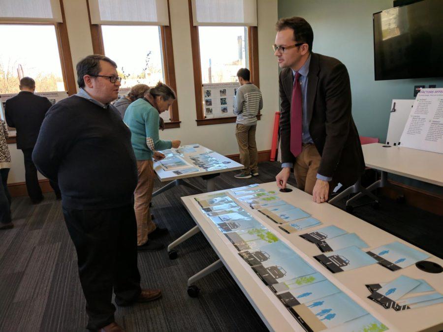 Adam Wood of Toole Design Group speaks with citizens at the Complete Streets Open House. The city of Ames is collaborating with Toole Design Group to draft the complete streets plan.