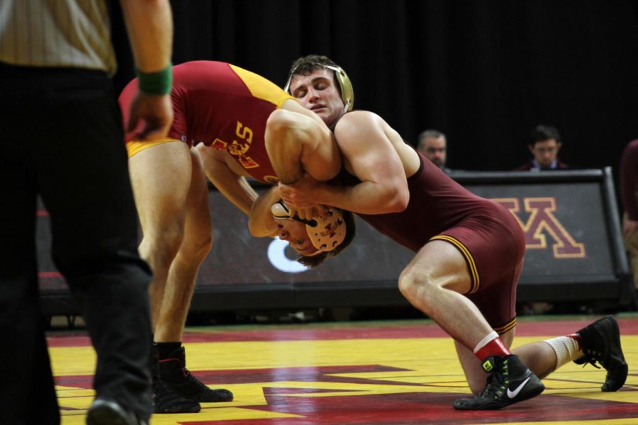 Colston DiBlasi wrestles Minnesotas No. 8 Jake Short on Feb. 19, 2017 in Hilton Coliseum. Short comes up with a 9-1 major decision over DiBlasi. Minnesota defeated Iowa State 40-7 in their final meet at home this season.