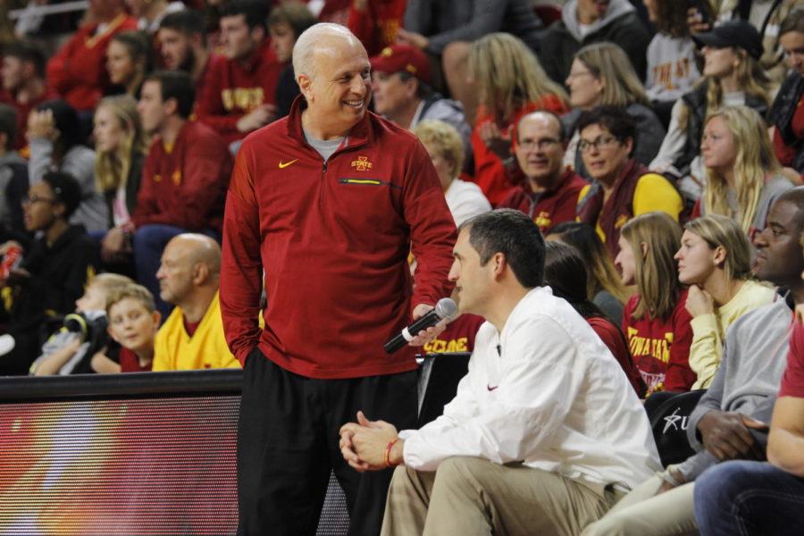 Iowa State play-by-play personality John Walters speaks with mens basketball coach Steve Prohm during Hilton Madness on Oct. 13.