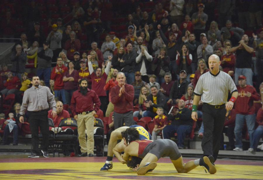 Ian+Paker+of+the+Iowa+State+wrestling+team+faces+off+against+Austin+DeSanto+from+Drexel+during+the+wrestling+meet+held+at+Hilton+Coliseum+on+Nov.+12.