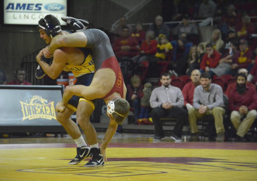 Luke Entzel of the Iowa State wrestling team faces off against Austin Rose from Drexel during the wrestling meet held at Hilton Coliseum on Nov. 12.