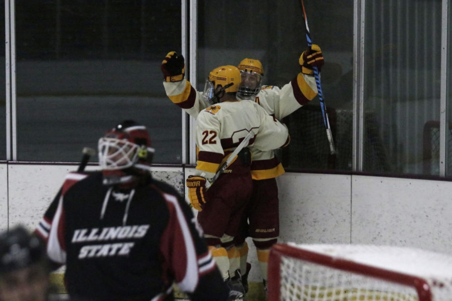 Junior Colton Kramer celebrates with junior Adam Alcott after Alcott scores a goal against Illinois State University on Sept. 23. The Cyclones defeated Illinois State 4-1.