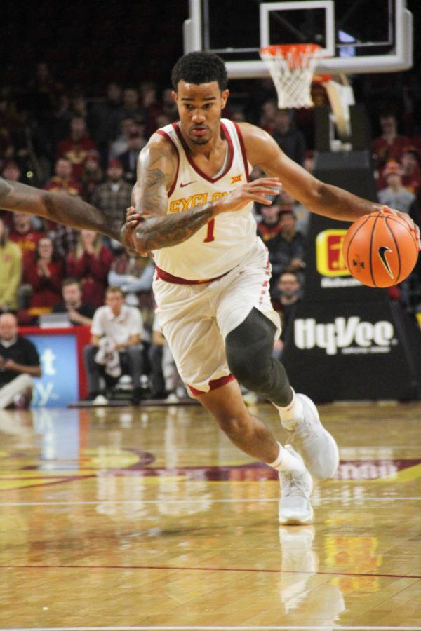 Junior Nick Weiler-Babb moving quickly down the court, past the opposing team, to score for the Cyclones at the Hilton Coliseum on Nov. 5.