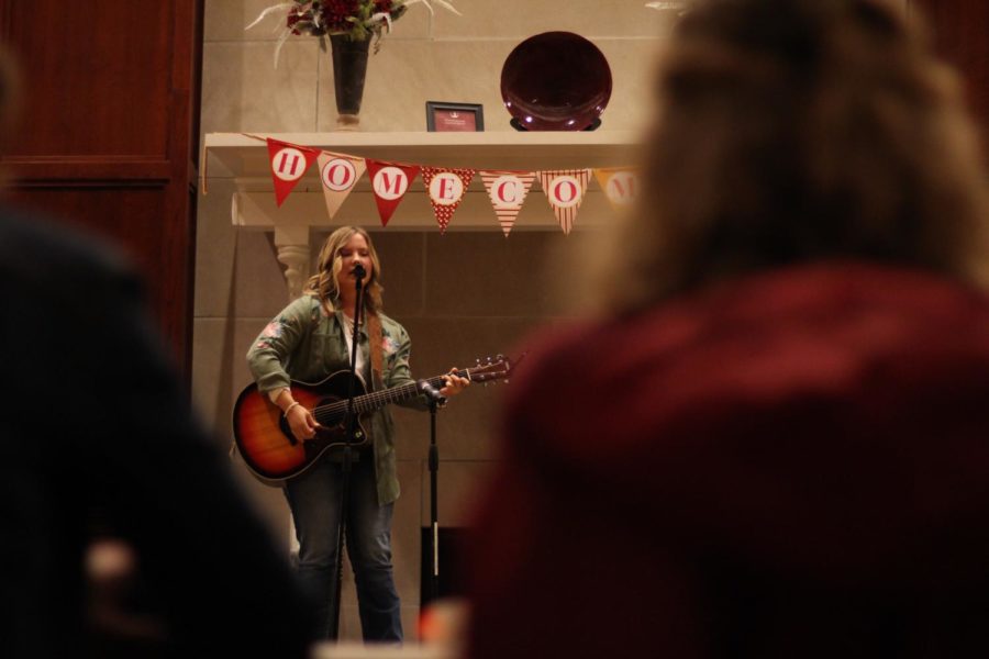 EllieMae Millenkamp, sophomore studying agriculture business, performs in the Reiman Ballroom in the Iowa State Alumni Center as a finalist of the Cyfactor talent competition on Oct. 24. 