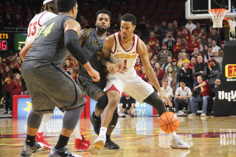 Junior Nick Weiler-Babb knocking the opponents out of the way to move into Hornet territory to score for the Cyclones on Nov. 5. at the Hilton Coliseum. 
