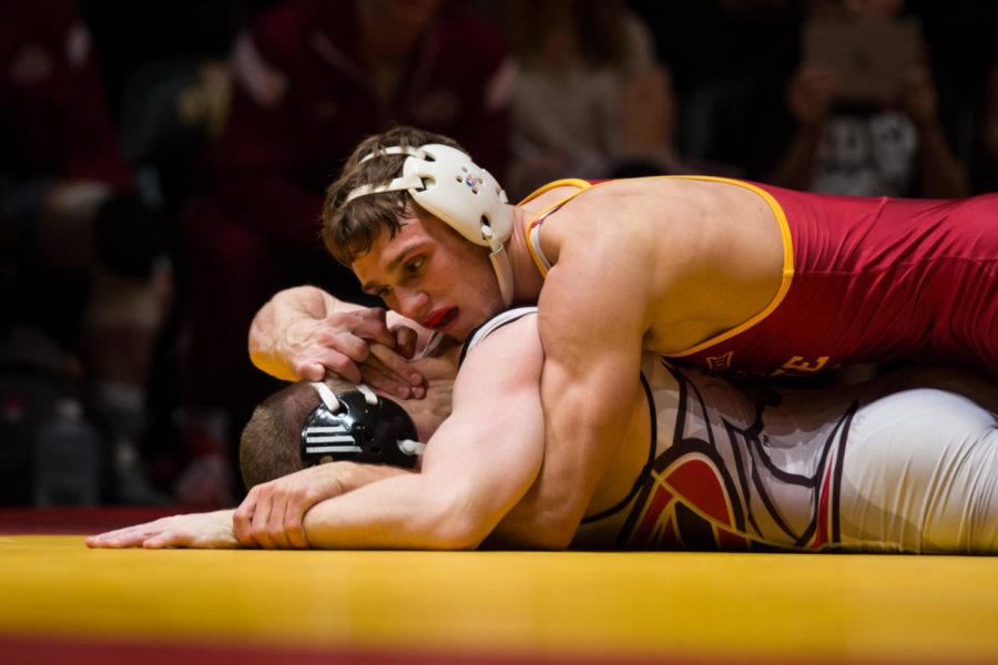 Redshirt Freshman Kanen Storr defeats Tyson Dippery Nov. 26 in Stephens Auditorium during the Iowa State vs Rider wrestling meet. The Cyclones were defeated 15-22. 