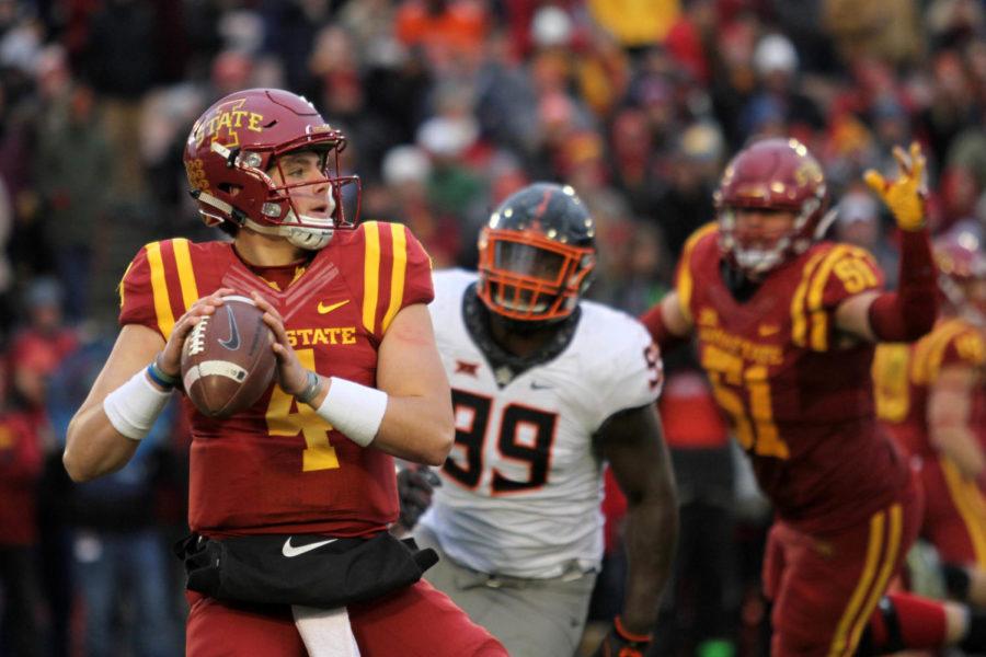 Quarterback+Zeb+Noland+looks+to+pass+during+a+game+against+Oklahoma+State+on+Nov.+11+at+Jack+Trice+Stadium.+Iowa+State+fell+to+the+Cowboys%2C+49-42.