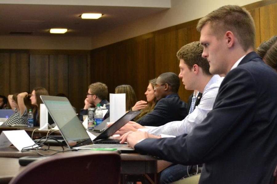 Student senators listen during the Student Government meeting in the Campanile Room April 19. 