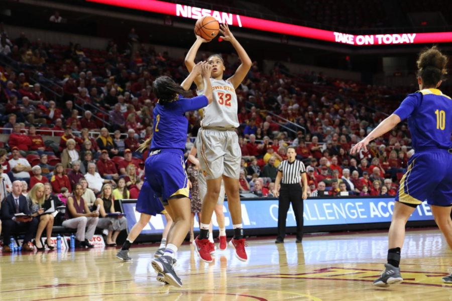 Iowa State junior Meredith Burkhall shoots during the first half against UMKC in Hilton Coliseum.