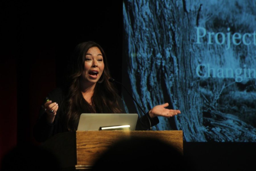 Matika Wilbur, a photographer from the Swinomish and Tulalip Tribes of the Pacific Northwest, speaks in the Great Hall in the Memorial Union on Nov. 13. We are on indigenous land all the time, Wilbur said during her lecture. 